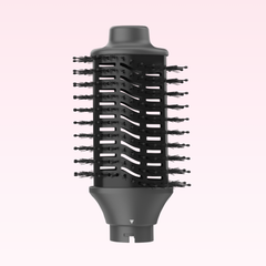 Wide blow-dry brush attachment for the Ace & Taylor Airstyler Pro on a pink background