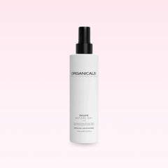Organicals Shape Before Dry spray bottle on a pink background